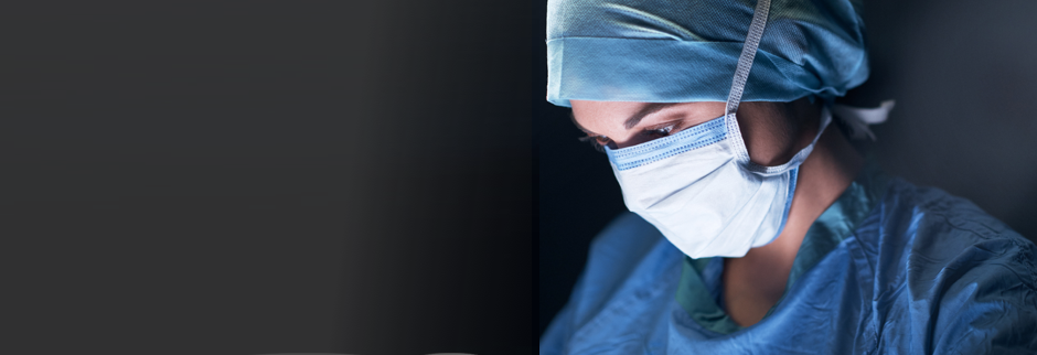 Close-Up of Physician Wearing Blue Surgical Scrubs